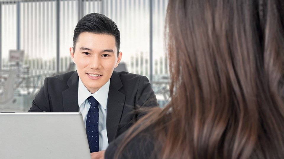 Two people in a meeting